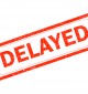 Delayed,Red,Rubber,Stamp,On,White,Background.,Delayed,Stamp,Sign.