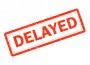 Delayed,Red,Rubber,Stamp,On,White,Background.,Delayed,Stamp,Sign.