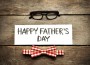 Happy,Father's,Day,Inscription,With,Red,Bow,Tie,And,Glasses