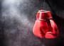 Pair,Of,Red,Boxing,Gloves,Hanging,On,The,Wall