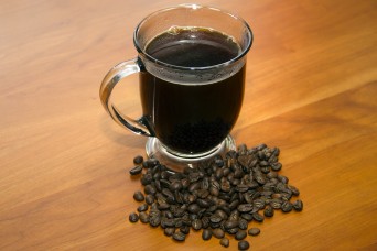 Coffee in Cup with whole beans Horizontal