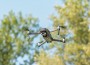 Dron,With,Camera,,The,Drone,Flies,Against,The,Background,Of